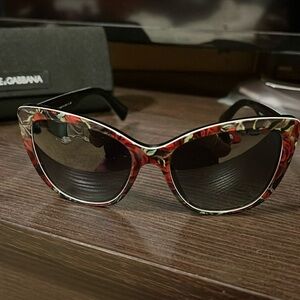 Women’s black floral Dolce & Gabbana sunglasses